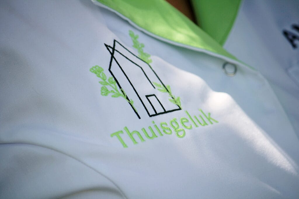 Thuisgeluk schort voor persoonsgerichte zorg